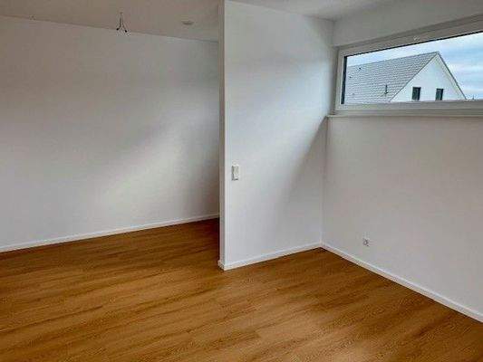 Schlafzimmer mit Ankleidebereich