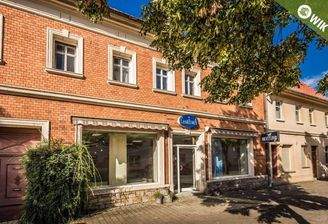 Wohn- und Geschäftshaus...