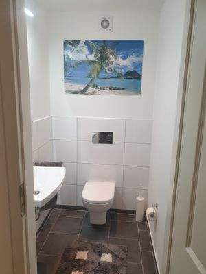 Badezimmer mit Strandbild