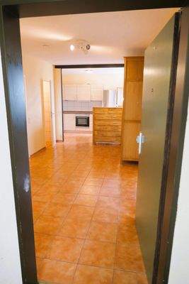 Eingangsbereich mit offener Küche