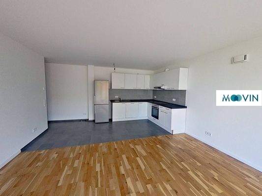 Ansicht II: Wohn- und Esszimmer mit offener Küche