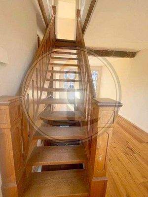 Erste Ebene mit Aufgang ins Dachgeschoss