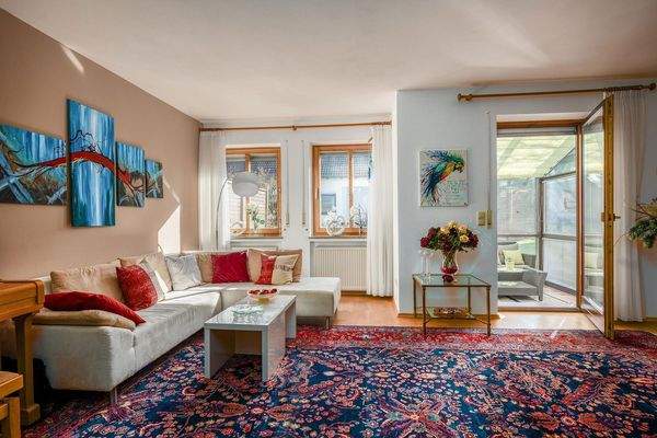 Wohnzimmer mit Wintergarten