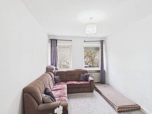 Wohnzimmer mit Teppichboden (WHG 1)