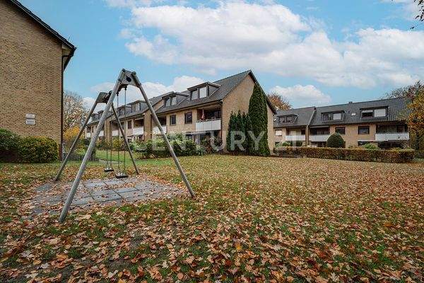 Rückansicht und gemeinschaftliche Grünfläche