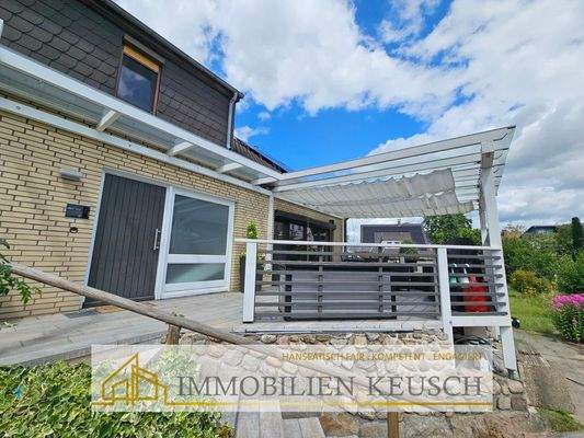 hinterer Eingang mit überdachter Terrasse