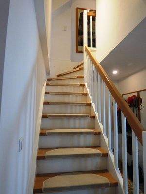 Treppe zum Spitzboden.