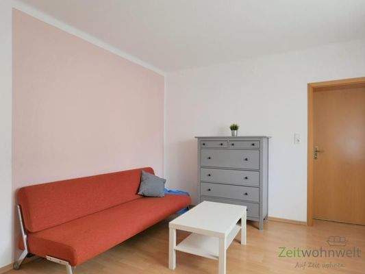 Schlafcouch und Kommode