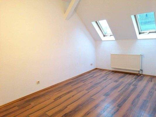 Schlafzimmer mit Laminat