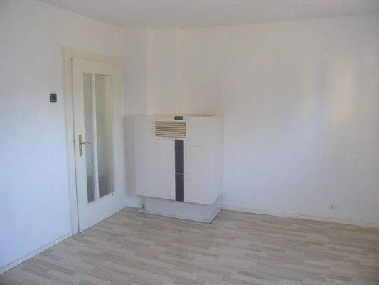 Wohnzimmer mit Kachelofen