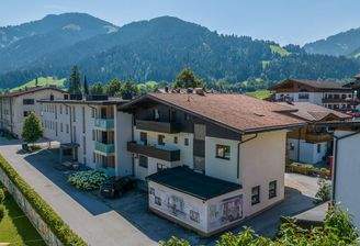 KITZIMMO-Grundstück mit Baugenehmigung für 5 Wohnungen - Immobilien Söll.