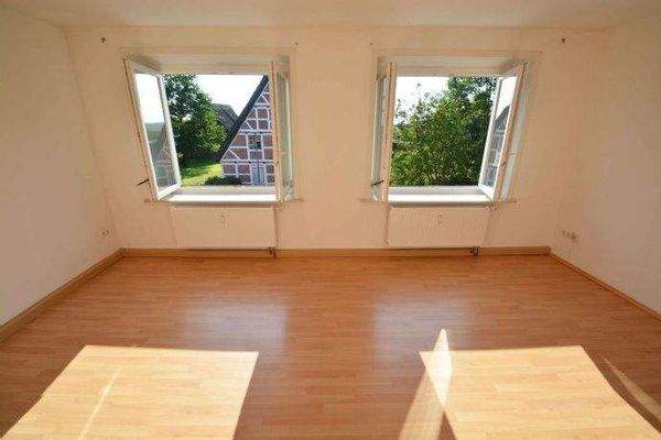 Wohn-/Esszimmer (Beispielwohnung im 1. OG)