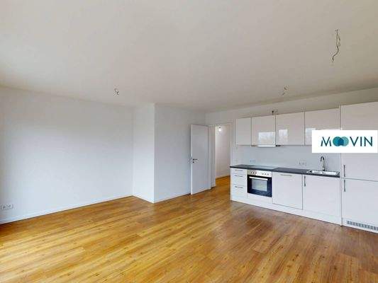 Ansicht III: Wohn- und Esszimmer mit offenem Küchenbereich