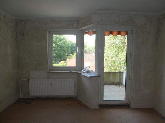 Wohnzimmer mit Balkon