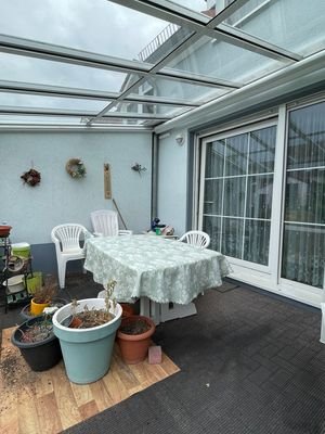 glasüberdachte Terrasse