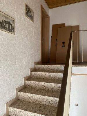 Treppenhaus und Zugang zur WHG