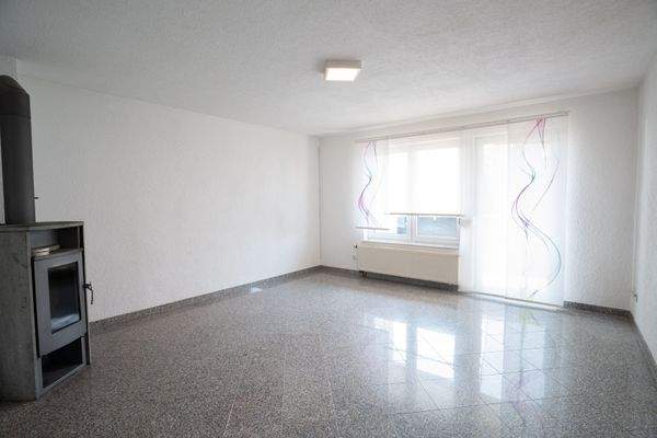 Wohnzimmer mit Kamin