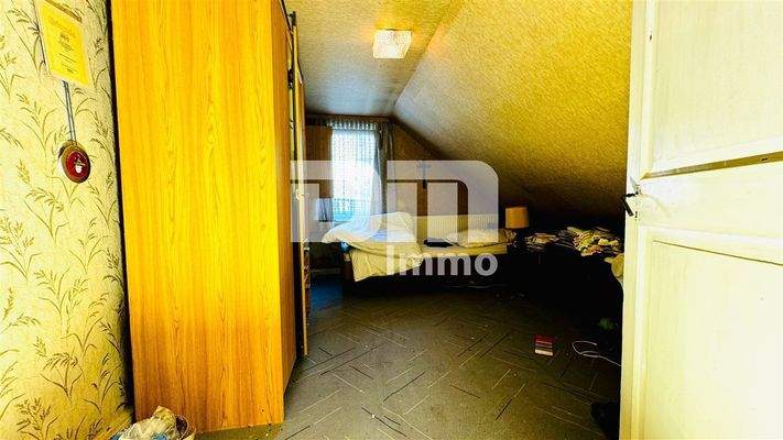 Wohnhaus OG / DG Schlafzimmer 2 / Kinderzimmer