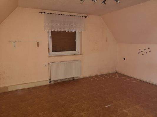 Haus 1 - Schlafzimmer im Obergeschoss.jpg