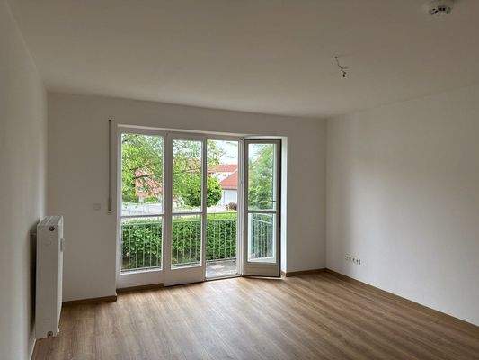 Wohnzimmer mit Balkon