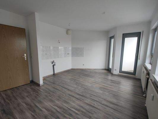 Wohnzimmer mit offener Küche.jpg