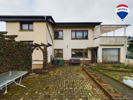 RE/MAX Immobilien DeLux Gartenansicht 2