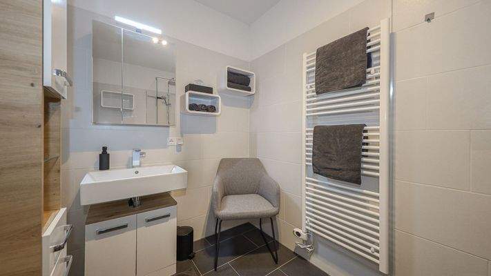 KITZIMMO-exklusive Neubauwohnung mit Hahnenkammblick - Immobilien Kitzbühel.-12