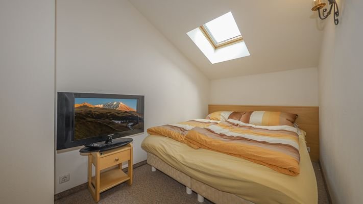 KITZIMMO-Dachgeschosswohnung mit Kaiserblick - Immobilien Aurach.