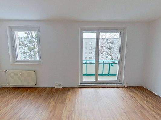 Ansicht III: Wohn- und Esszimmer mit offenem Küchenbereich