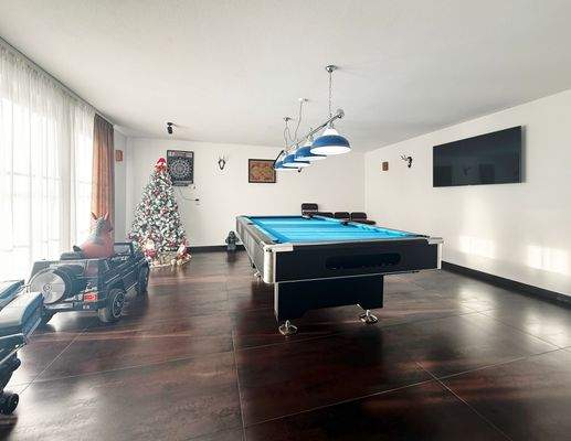 Wohnraum im UG, derzeit als Billard- und Freizeitzimmer genutzt 
