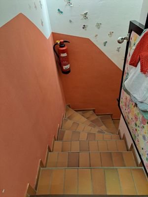 Treppe zum unteren Lagerraum