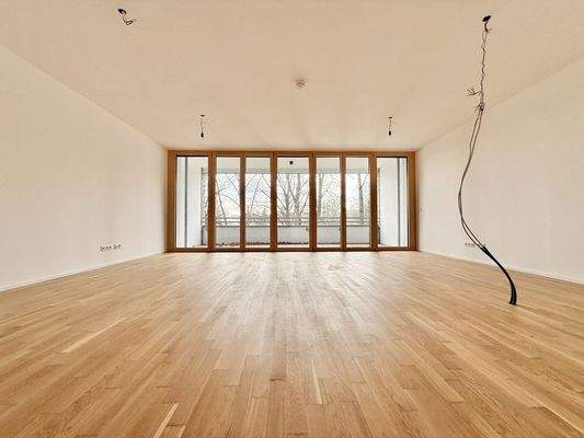 Wohnzimmer mit offener Küche