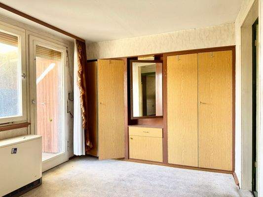 Schlafzimmer mit Einbauschränken