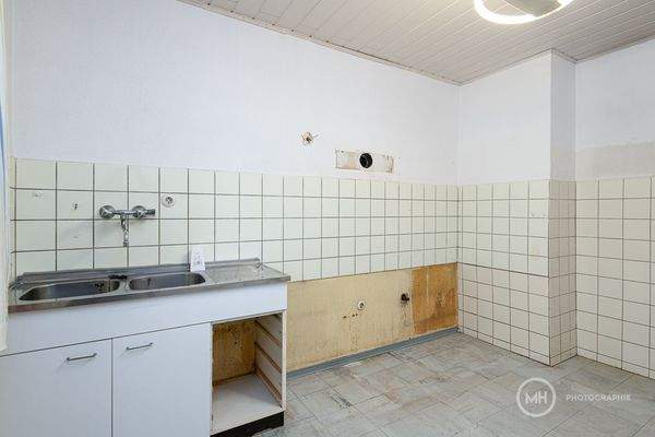 Küche mit Sitzmöglichkeit