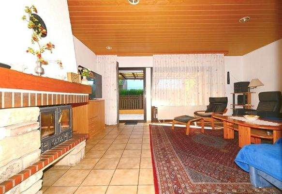 Wohnzimmer mit Kamin