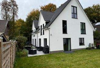 DHH mit Gauben Satteldach Beispiel