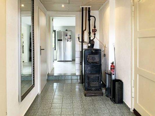 Diele mit zentraler Ofenheizung