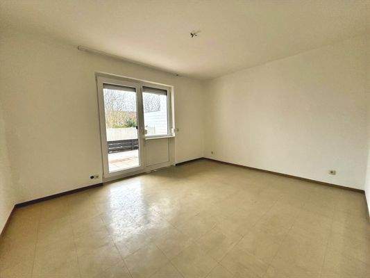 Schlafzimmer mit Zugang zum Balkon