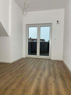 Schlafzimmer mit Balkon