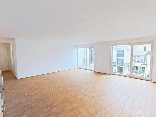 Ansicht IV: Wohn- und Esszimmer mit offenem Küchenbereich