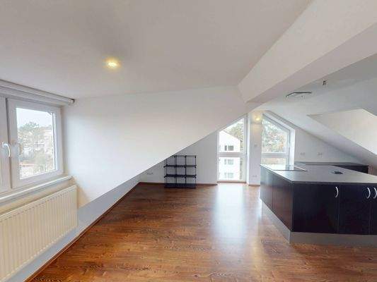 Ansicht II: Wohn- und Esszimmer mit offenem Küchenbereich