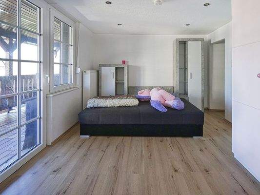Schlafzimmer mit Zugang zum...