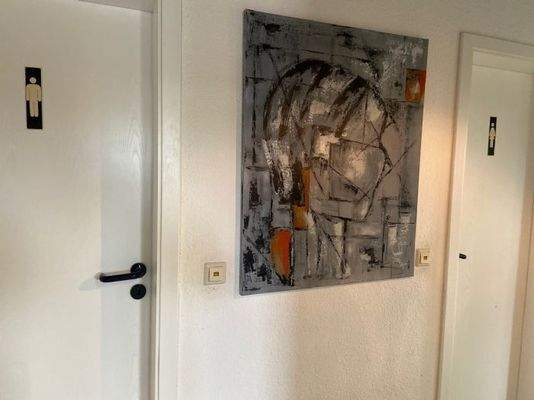 Damen- und Herrentoilette