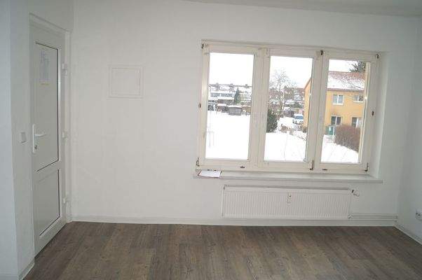 Wohnzimmer mit Eingangsbereich