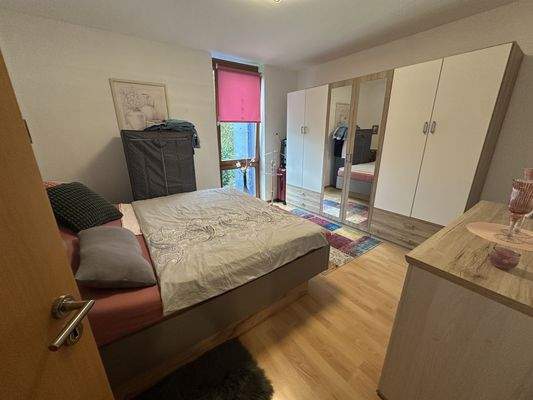 Schlafzimmer (Wohnung W1)