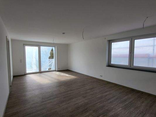 Wohnzimmer mit Balkon