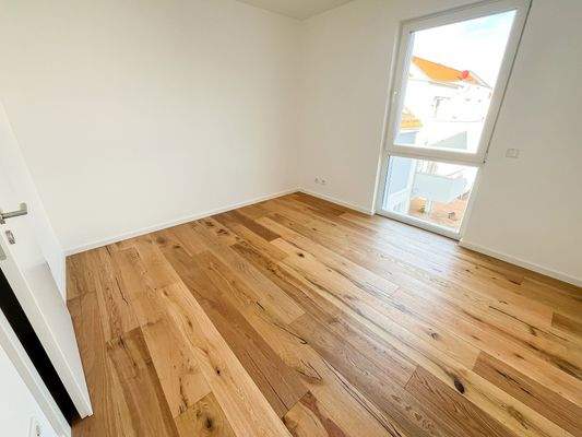 eines der Kinderzimmer oder Büros Whg 19