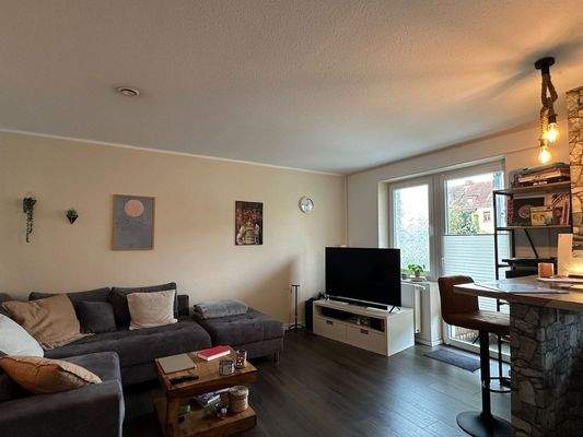 Wohnbereich mit Zugang auf den Südwestbalkon