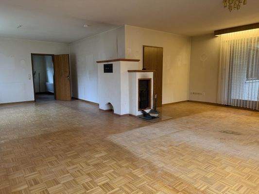 Wohn- und Esszimmer mit Kamin