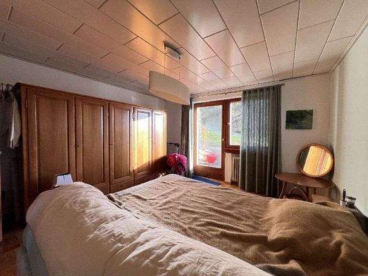 Schlafzimmer mit Balkonzugang